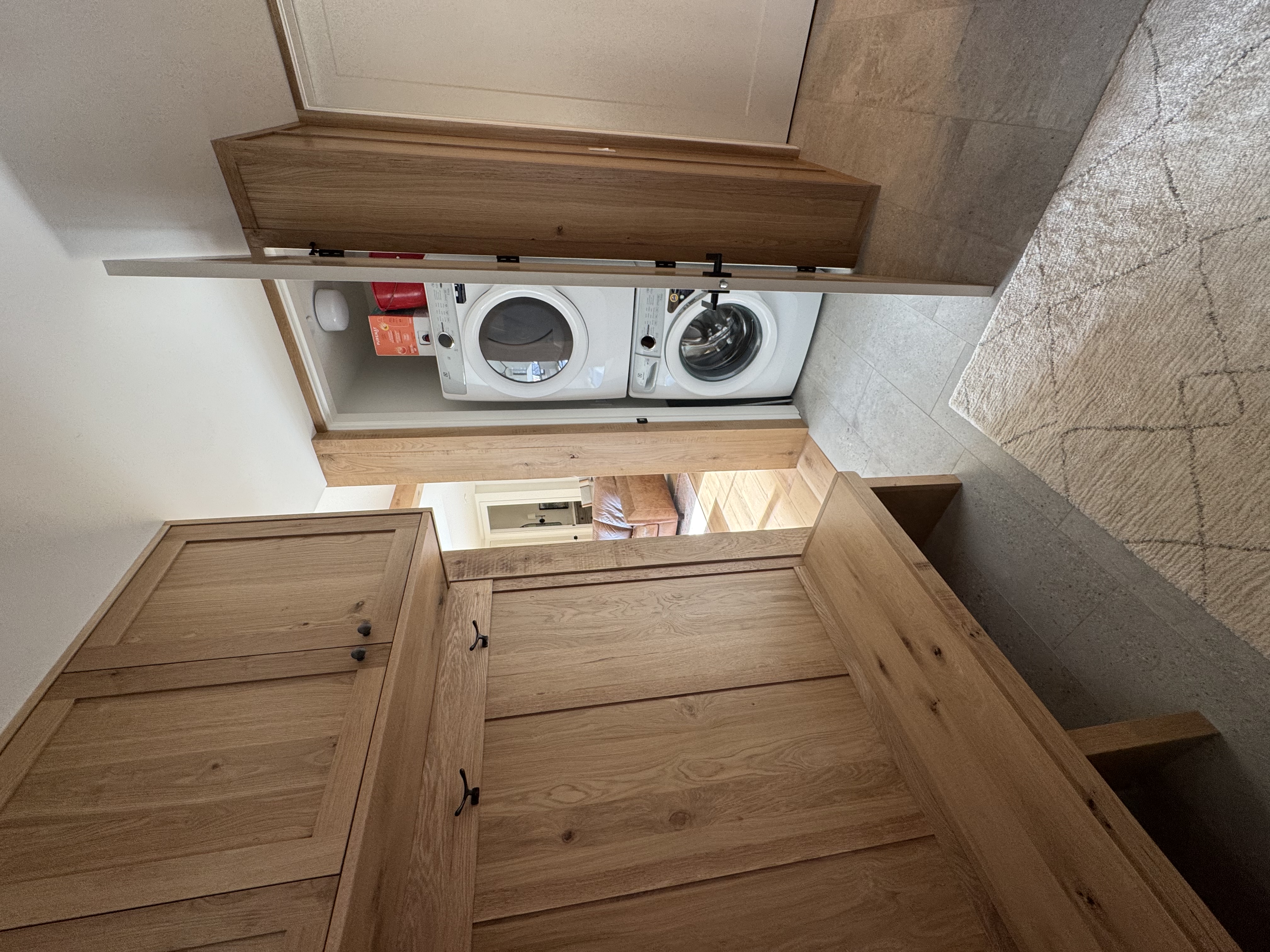 Mudroom with stacked washer and dryer